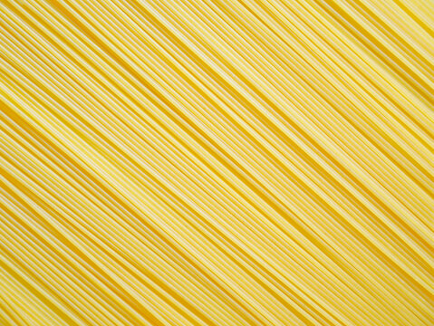 Dried capellini spaghetti pattern background