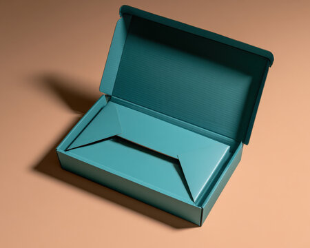 Teal box stands open on warm-toned surface