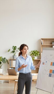 Young professional presenting prototype board in modern office
