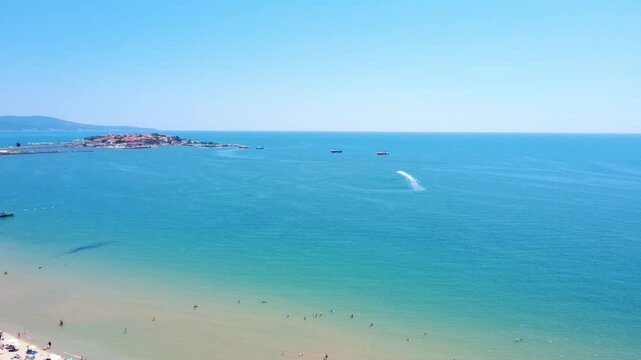 Aerial drone view of South Beach and Old Town Nessebar peninsula on the Black Sea coast in Bulgaria