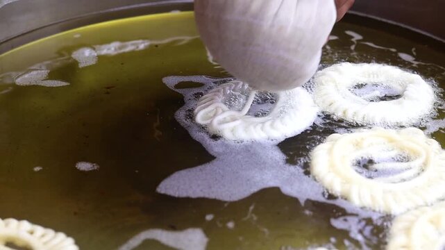 Imarti or jalebi an indian dessert fried in oil then dipped in sugar syrup