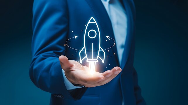 Businessman holding a glowing rocket icon