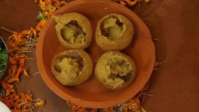 Dahi puri or dahi batashe an indian sweet,tangy and spicy snack