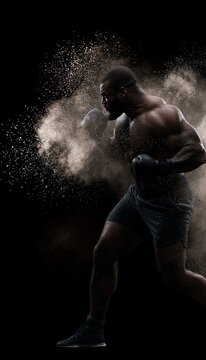 Boxer delivering explosive uppercut during shadowboxing in dramatic gym lighting