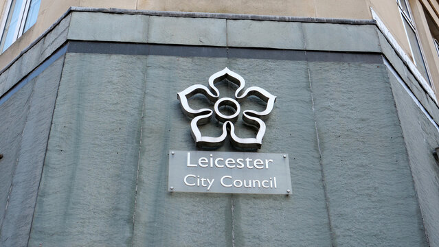 Leicester, England, UK - 19 July 2026: Leicester City Council sign, municipal building facade with emblem, local government