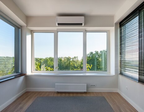 modern interior with central air conditioning unit and large windows
