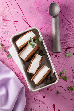 Delicious ice cream sandwiches  on pink table