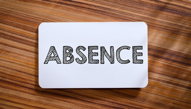 handwritten absence text on a plain index card