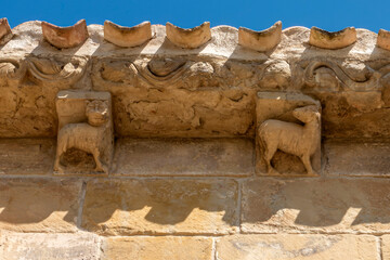 Carved stone corbels depicting animal figures under the eaves of the 12th century Romanesque Ermita de Santa Maria de la Antigua in Banares, La Rioja, Espana © Nandi Estévez