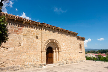 Ermita de Nuestra Senora Virgen de las Eras, a 12th century Romanesque hermitage featuring a polylobed portal, corbelled eaves, and ashlar stone masonry, located in Santa Gadea del Cid, Burgos, Spain © Nandi Estévez