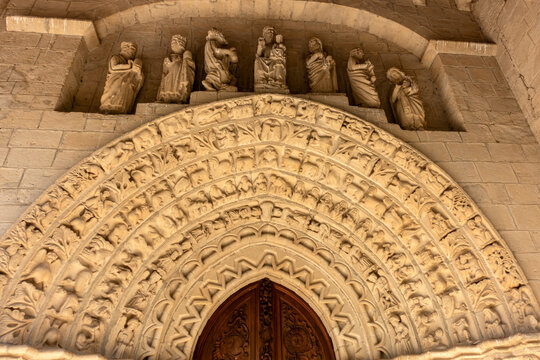 Carved portal detail with archivolts & frieze of Virgin, Child & saints. Church of Nuestra Se&ntilde;ora de la Asunci&oacute;n, Tuesta (&Aacute;lava, Spain, late 12th&ndash;early 13th C Romanesque transitional stone)
