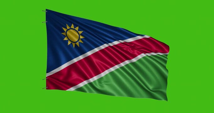 Namibian flag waving on green background during daylight