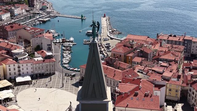 Aerial view of Archangel Michael statue on St George Cathedral, Piran, Slovenia