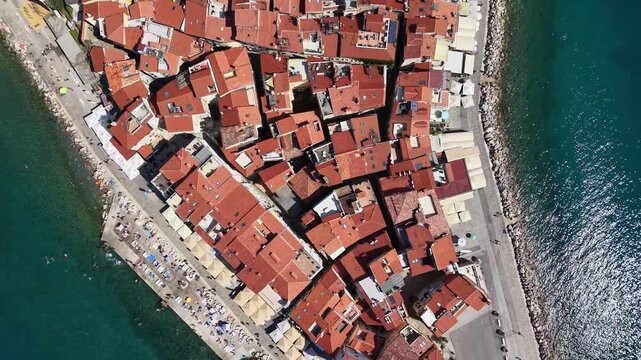Top-down view of red tiled roofs on Piran peninsula, Slovenia