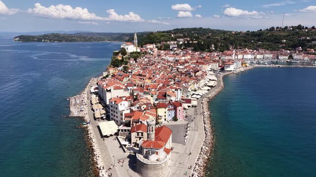 Aerial view of Punta lighthouse annd waterfront promenade in Piran, Slovenia
