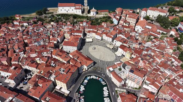Flight over Tartini square and town center in Piran peninsula, Slovenia