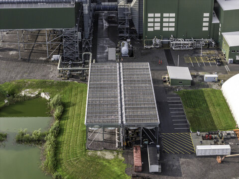 Aerial view of the air-cooled condenser ACC modules at Cricket Valley Energy Center, featuring industrial infrastructure and adjacent green space in Dover Plains, New York, United States.