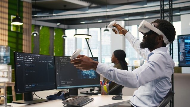 Administrator wearing a virtual reality headset uses AI scripts to automate repetitive tasks and speed up software feature implementation in a technology office.