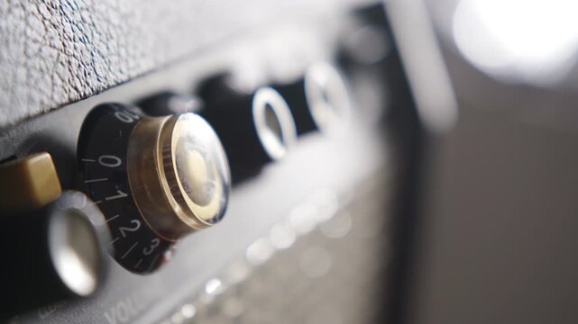 Adjusting Guitar Amplifier Volume Knob to Increase Sound Level