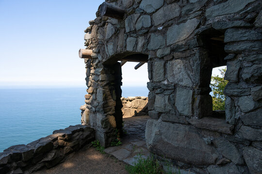 View of west shelter stone building on the Oregon coastline built by the Civilian Conservation Corps, CCC, Cape Perpetua Scenic Area, outdoor recreation
