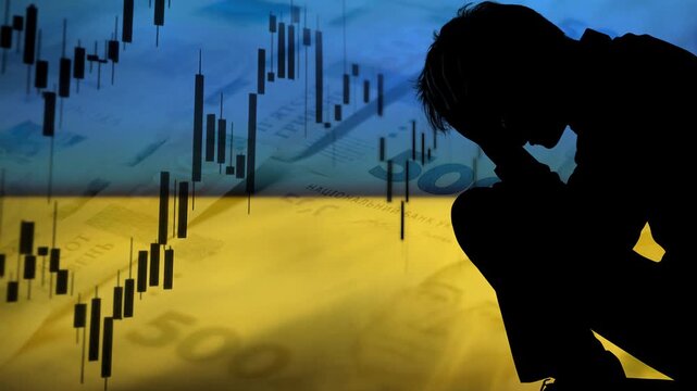 a frustrated person silhouette, financial stock charts, and Ukrainian hryvnia banknotes overlaid with the national flag, representing economic crisis and inflation in Ukraine