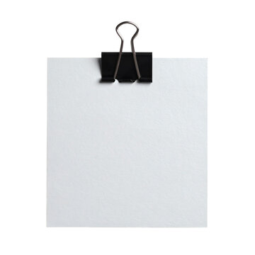 Clean white square paper sheet held by a small black metal binder clip in this high quality studio photograph captured for professional office supply design projects