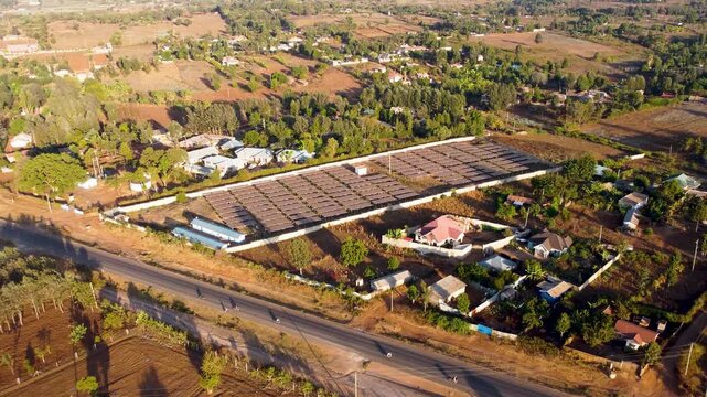 Aerial view of Tana Athi Water Service Loitokitok Office with solar panel arrays and surrounding rural landscape in Loolopon, Kajiado County, Kenya.