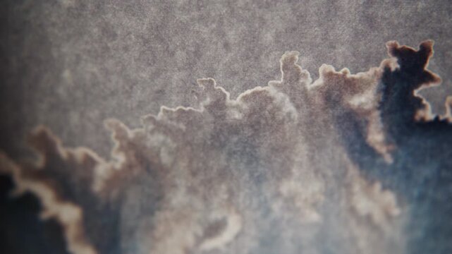 Abstract Cloud Shaped Stain on Textured Paper Surface with Moving Light Shadow Transition Video