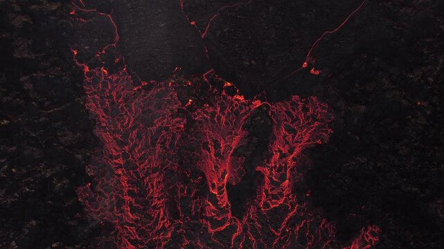 Aerial view of glowing lava flowing from the Litli-Hrutur volcanic eruption in Grindavik, Grindavikurbaer, Iceland.