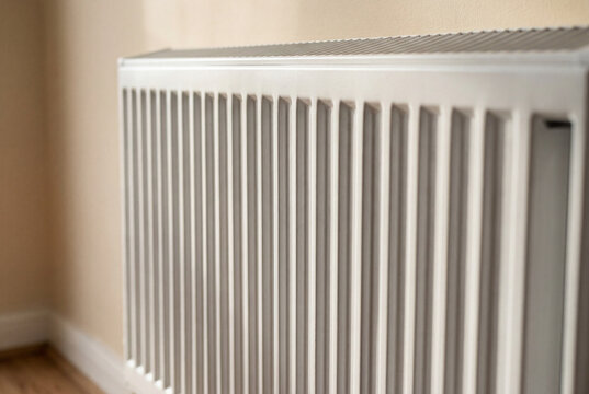 Close up detail of modern white panel home heating radiator