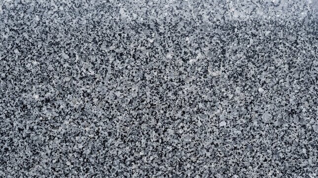 Dark grey granite stone texture with fine grains speckled background construction material