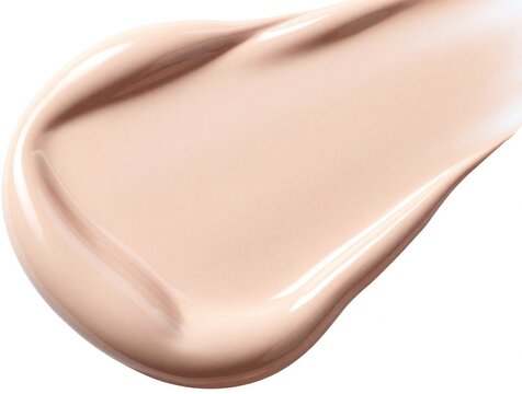 Liquid foundation makeup showing smooth creamy texture. Beige cosmetic fluid smear isolated on white background. Beauty product sample for skin tone matching and coverage.