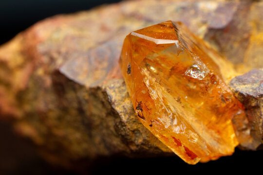 Rough imperial topaz stone. Minas Gerais, Brazil.