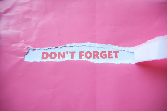 The words "DONT FORGET" were written on the back of that torn piece of paper&mdash;a phrase serving as a reminder of something important. It is often placed in strategic locations so that it catches the eye