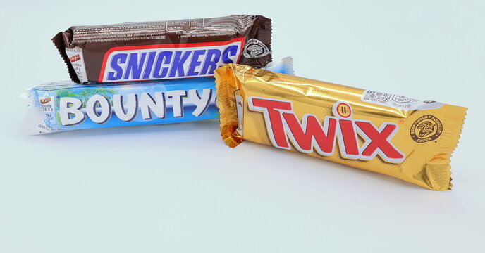 Different candy chocolate bars. Twix, Snickers and Bounty.