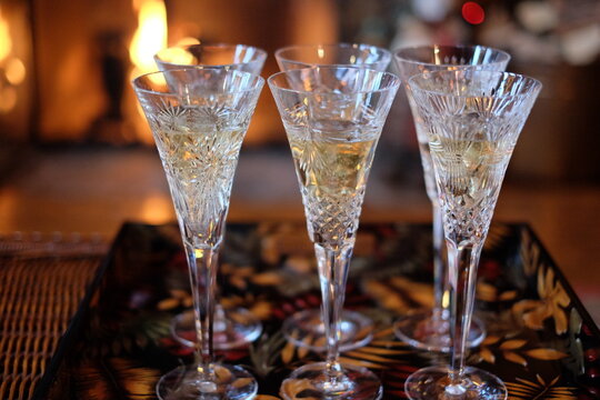 Champagne glasses over the fireplace