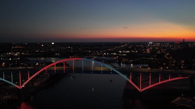   Aerial View of Daniel Webster Hoan Memorial Bridge Illuminated at Sunset, Milwaukee, Wisconsin&rdquo;on  August 3 2026