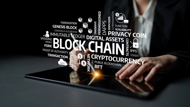 A business professional interacts with a tablet, exploring various concepts related to blockchain technology and cryptocurrency, representing the future of finance and innovation. Tessel