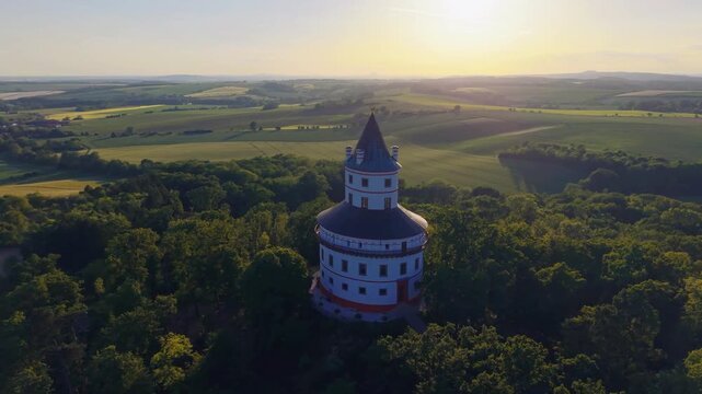 Aerial view of the historic Humprecht hunting lodge surrounded by lush forests and rolling fields in Sobotka, Kralovehradecky kraj, Czechia.