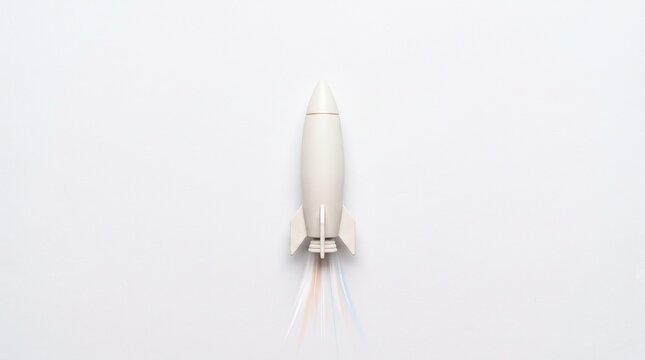 Minimalist rocket object launching with colorful smoke trails on white background