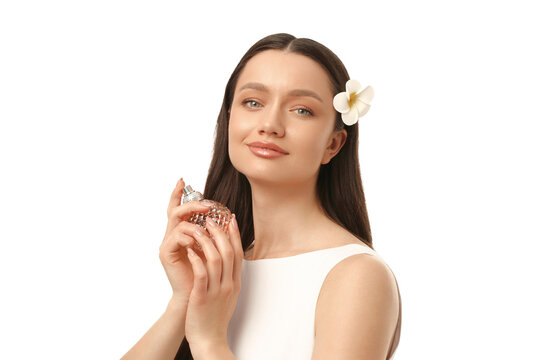 Model gracefully poses with perfume bottle, isolated on white, PNG