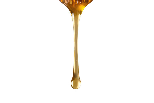 Thin golden syrup stream ending in a droplet