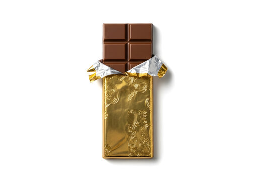 Close up of gold foil wrapped chocolate bar with decorative ribbon gift tie on white background