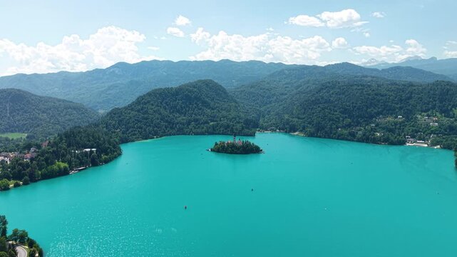Drone View of Lake Bled, Slovenia, Turquoise Alpine Water, Island and Hills of Julian Alps