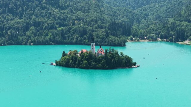 Lake Bled, Slovenia. Drone Shot Church of the Assumption of the Blessed Virgin Mary on Small Island in Turquoise Water