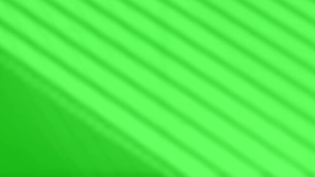 Shadows cast diagonal lines across a green surface creating a minimalist texture perfect for professional graphic backgrounds.