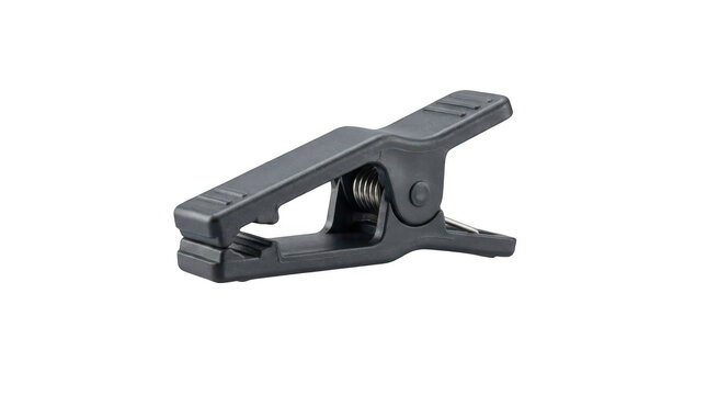 Essential sturdy black plastic spring clamp tool for photography studio equipment and versatile workshop tasks isolated transparent background