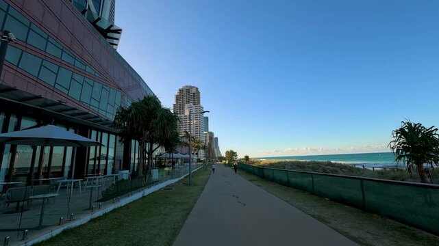 Coastal Pedestrian Walkway and Modern High-Rise Buildings in Surfers Paradise