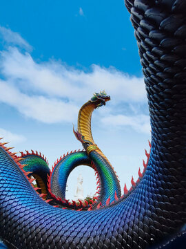 Giant Thai dragon serpent sculpture, sacred Naga statue in Thailand landmark