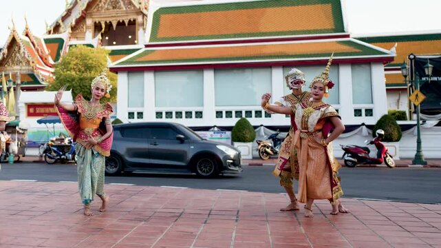 Traditional Thai Khon Dancers Performing Near Temple in Bangkok